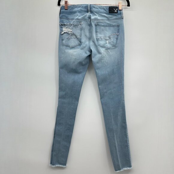 American Eagle 360 Degree Stretch Light Wash Distressed Skinny Jeans Size 4 - Picture 4 of 7